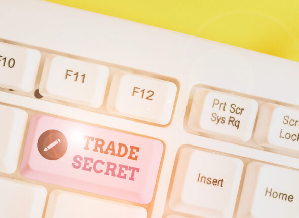 Writing note showing Trade Secret. Business photo showcasing technique used by a company in analysisufacturing its products White pc keyboard with note paper above the white background.