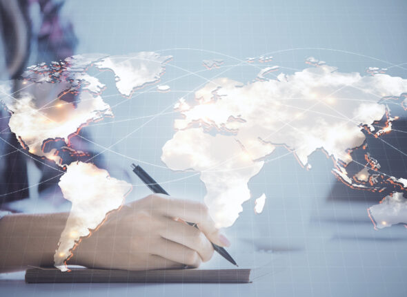 International business hologram over hands taking notes background. Concept of success. Multi exposure
